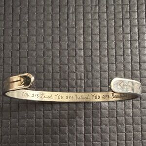 Silver Inspirational Cuff Bracelet featuring the engraved messages.